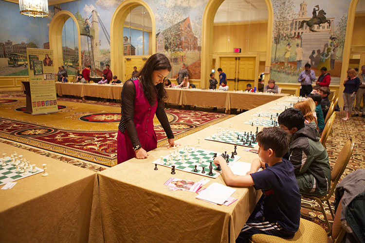 Chess Queen Alexandra Kosteniuk gives a simul at the SuperNationals in Nashville 